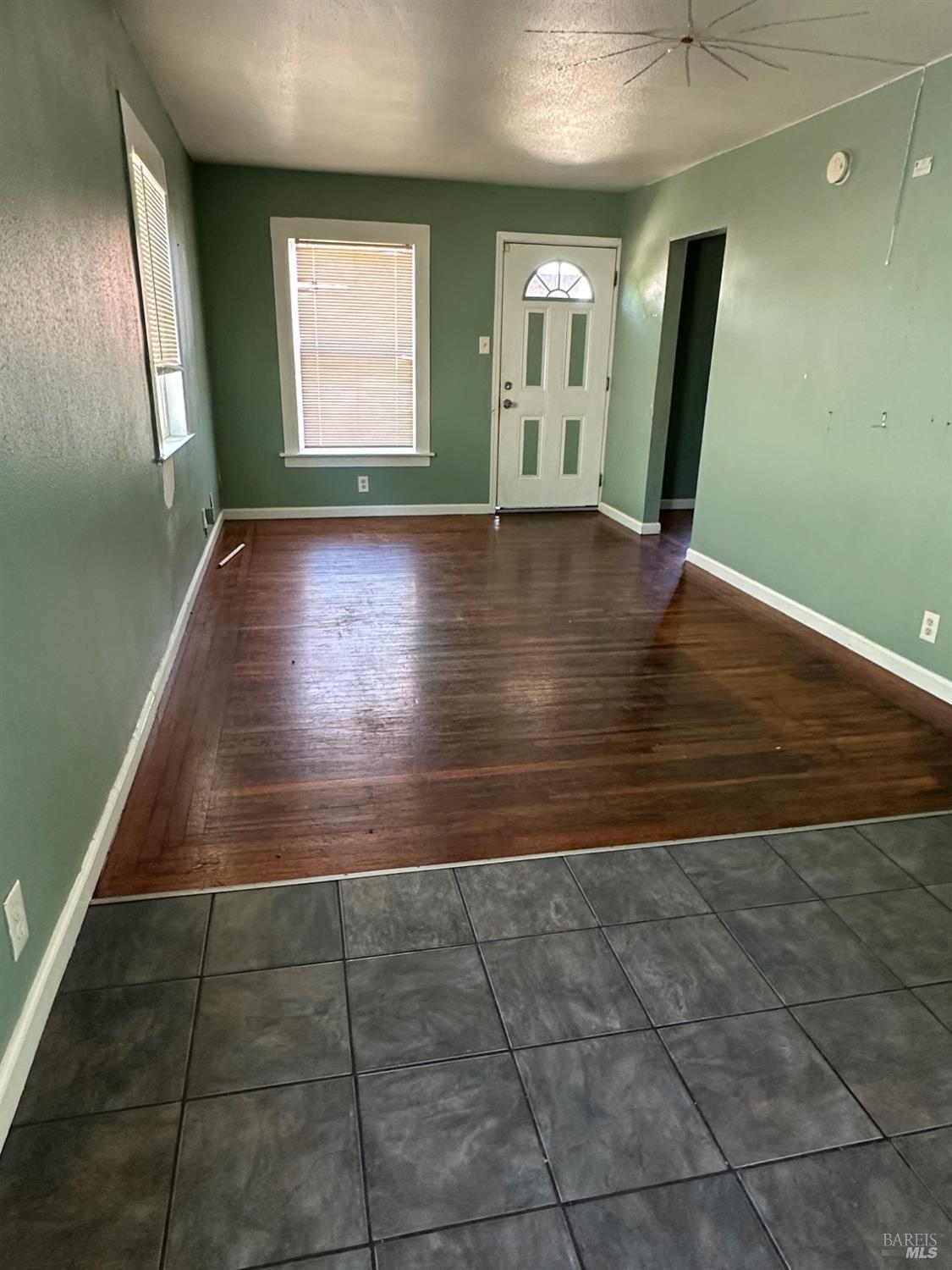 1815 Ohio Street Vallejo, CA 94590 - Photo 3 of 8 a view of entryway with window and wooden floor