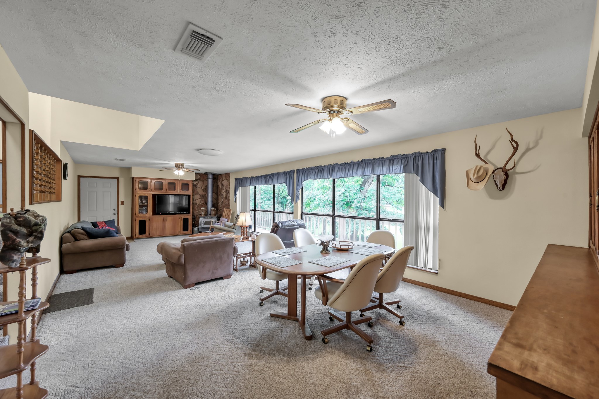 254 Sharp Lane Trinity, TX 75862 - Photo 8 of 36 a living room with furniture and a large window
