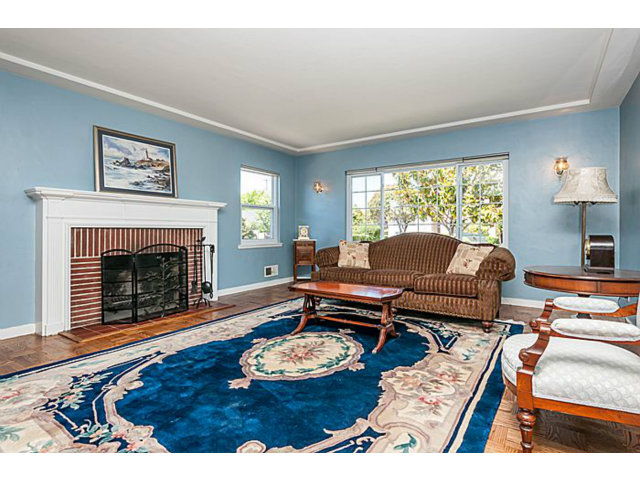 29 Dwight Road Burlingame, CA 94010 - Photo 2 of 20 a living room with furniture and a fireplace