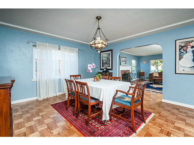 29 Dwight Road Burlingame, CA 94010 - Photo 4 of 20 a dining room with furniture a chandelier and wooden floor