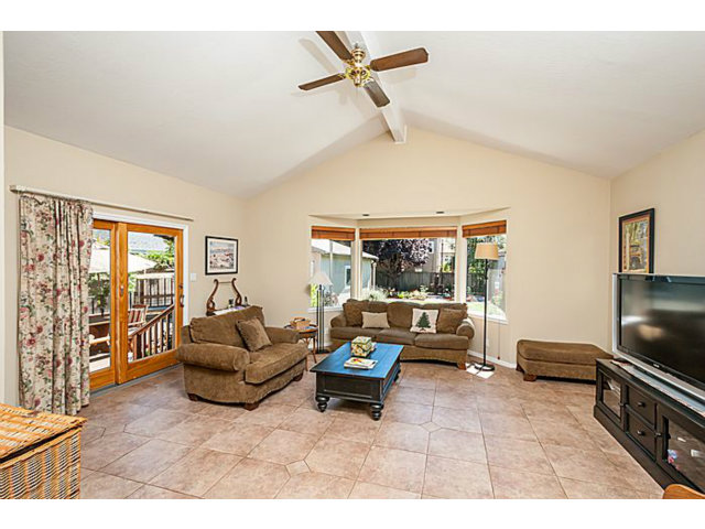 29 Dwight Road Burlingame, CA 94010 - Photo 7 of 20 a living room with furniture and a flat screen tv