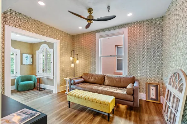 a living room with furniture and a window
