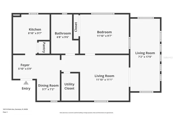 a front view of a multi story residential apartment building with a yard
