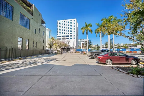 a building with cars parked in front of it
