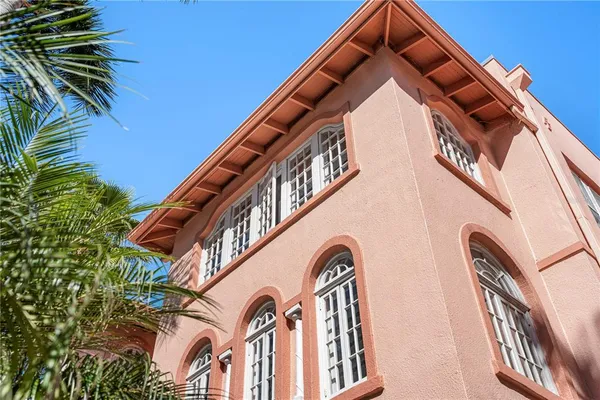 a view of a porch with a small yard