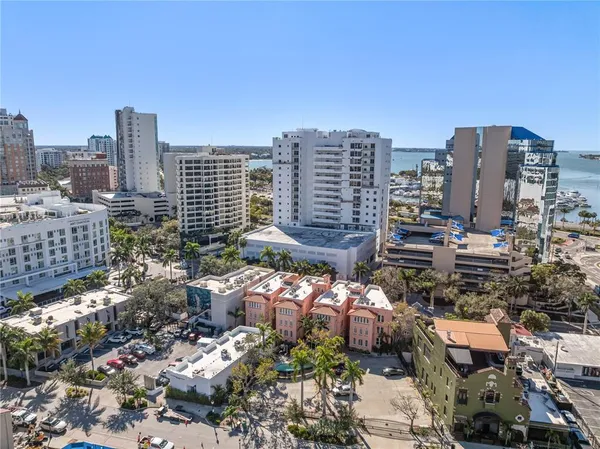 a view of a city with tall buildings