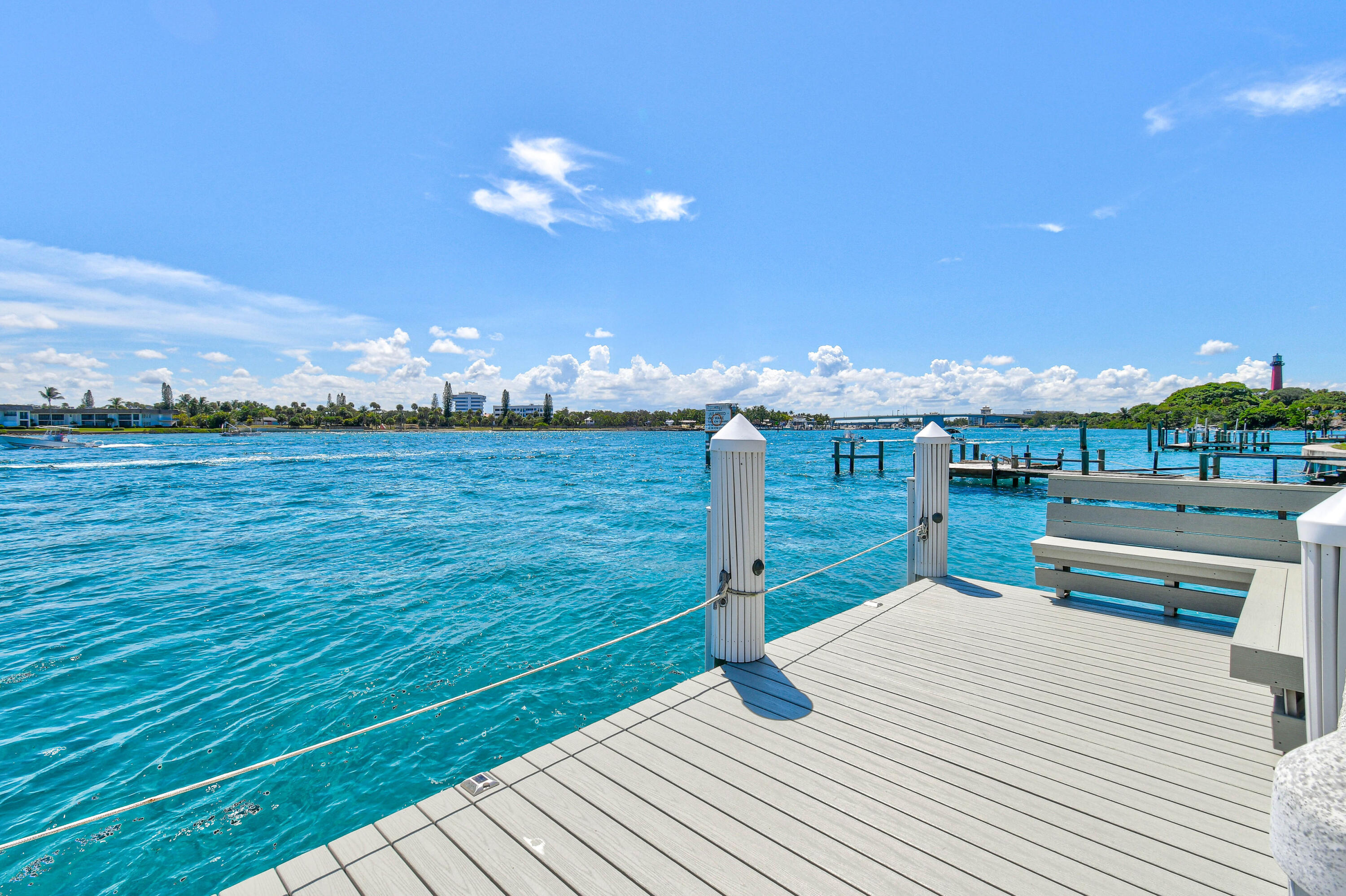 87 Lighthouse Drive Jupiter Inlet Colony, FL 33469 - Photo 19 of 33 a view of a terrace and a yard