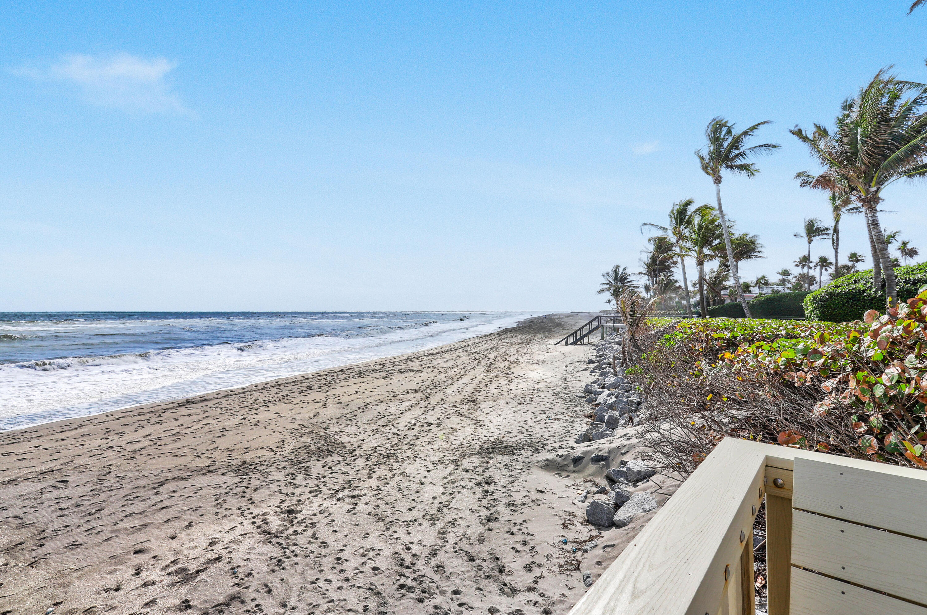87 Lighthouse Drive Jupiter Inlet Colony, FL 33469 - Photo 28 of 33 a view of a yard with an ocean view