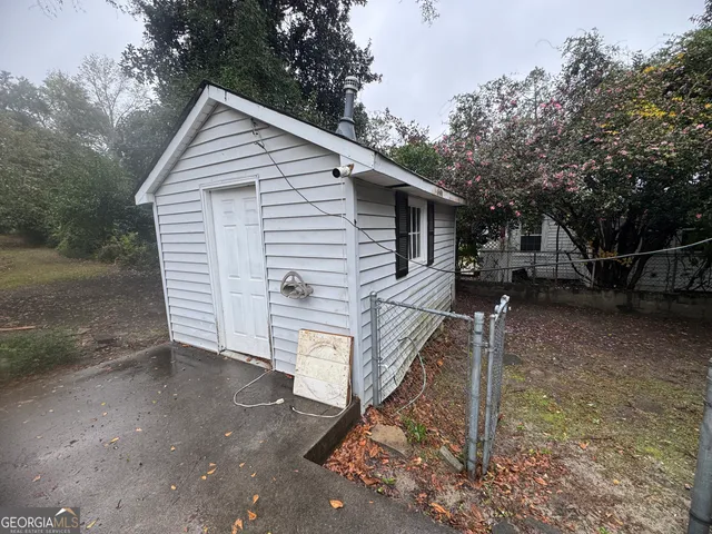 a view of outdoor space with trees all around