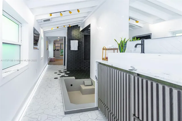 a bed room with a bed and a couch