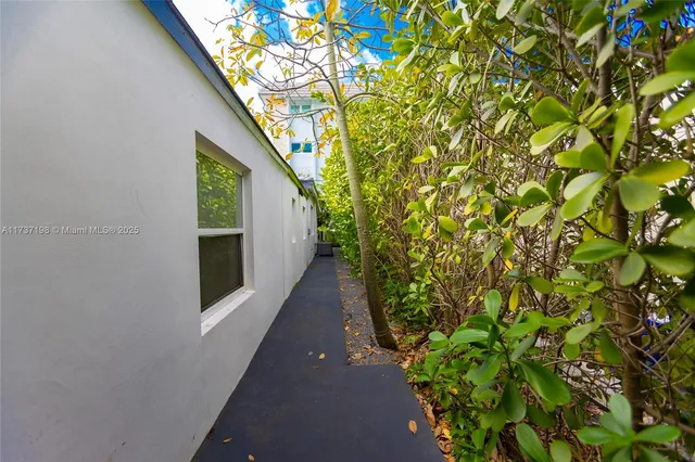 a backyard of a house with lots of green space