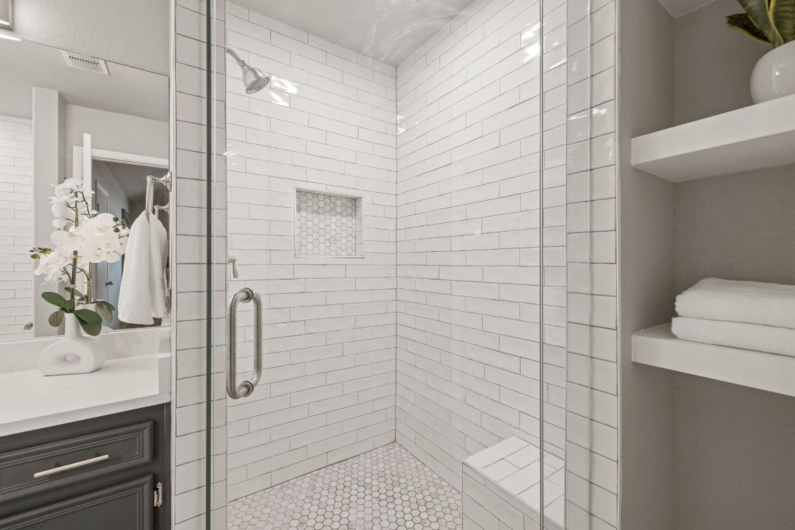 1805 Ryon Cove Round Rock, TX 78681 - Photo 15 of 23 a bathroom with a sink a toilet and shower