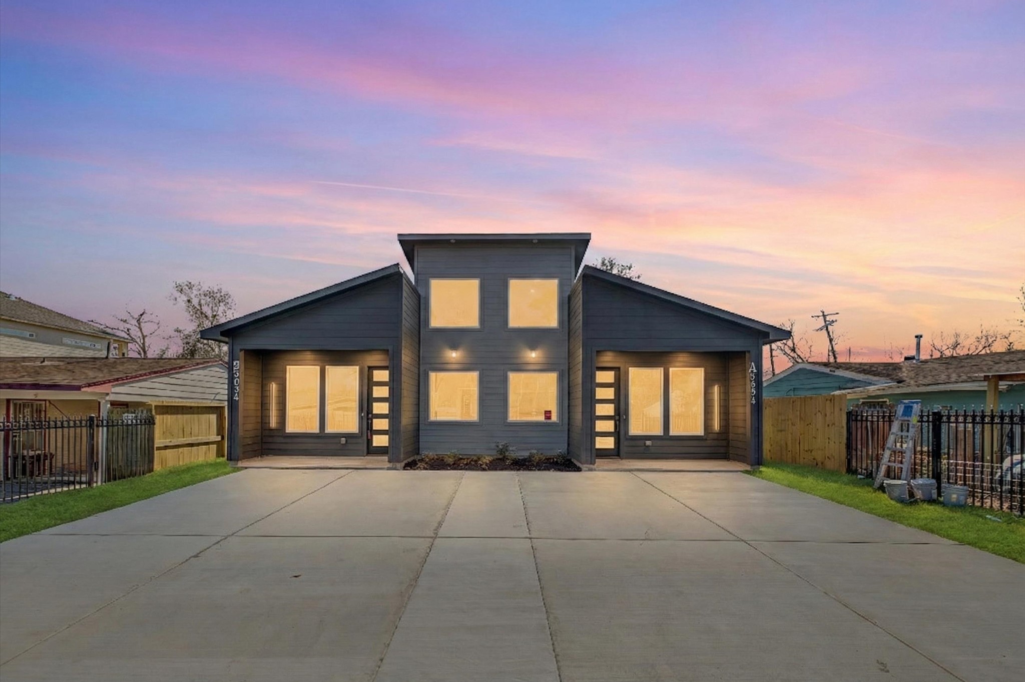 5034 Pershing Street, Unit B Houston, TX 77033 - Photo 3 of 26 a front view of a house with a yard