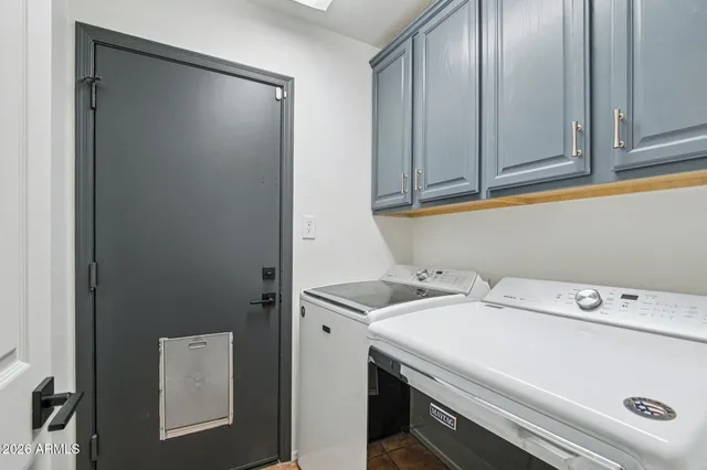a bathroom with a granite countertop sink a toilet and a bathtub