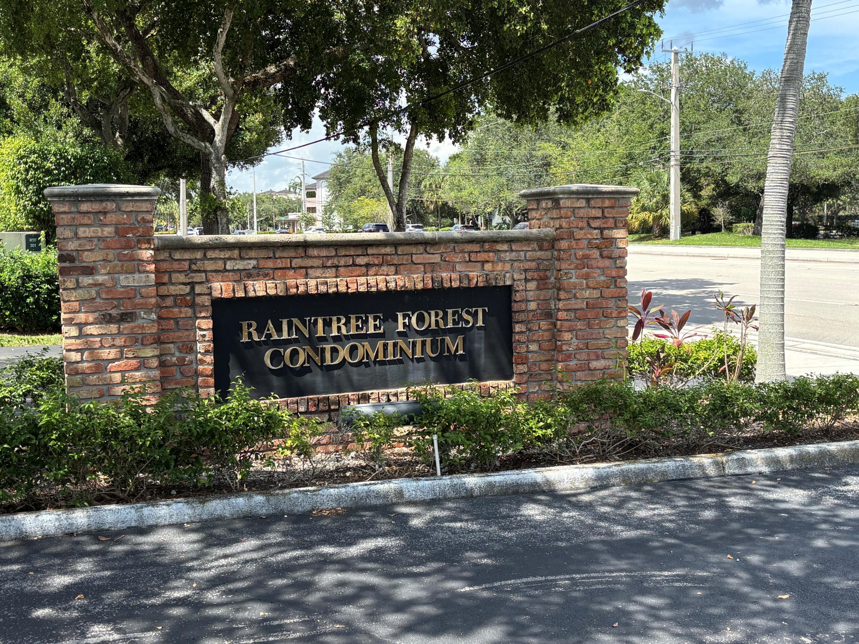 301 North Pine Island Road, Unit 105 Plantation, FL 33324 - Photo 1 of 9 Raintree sign
