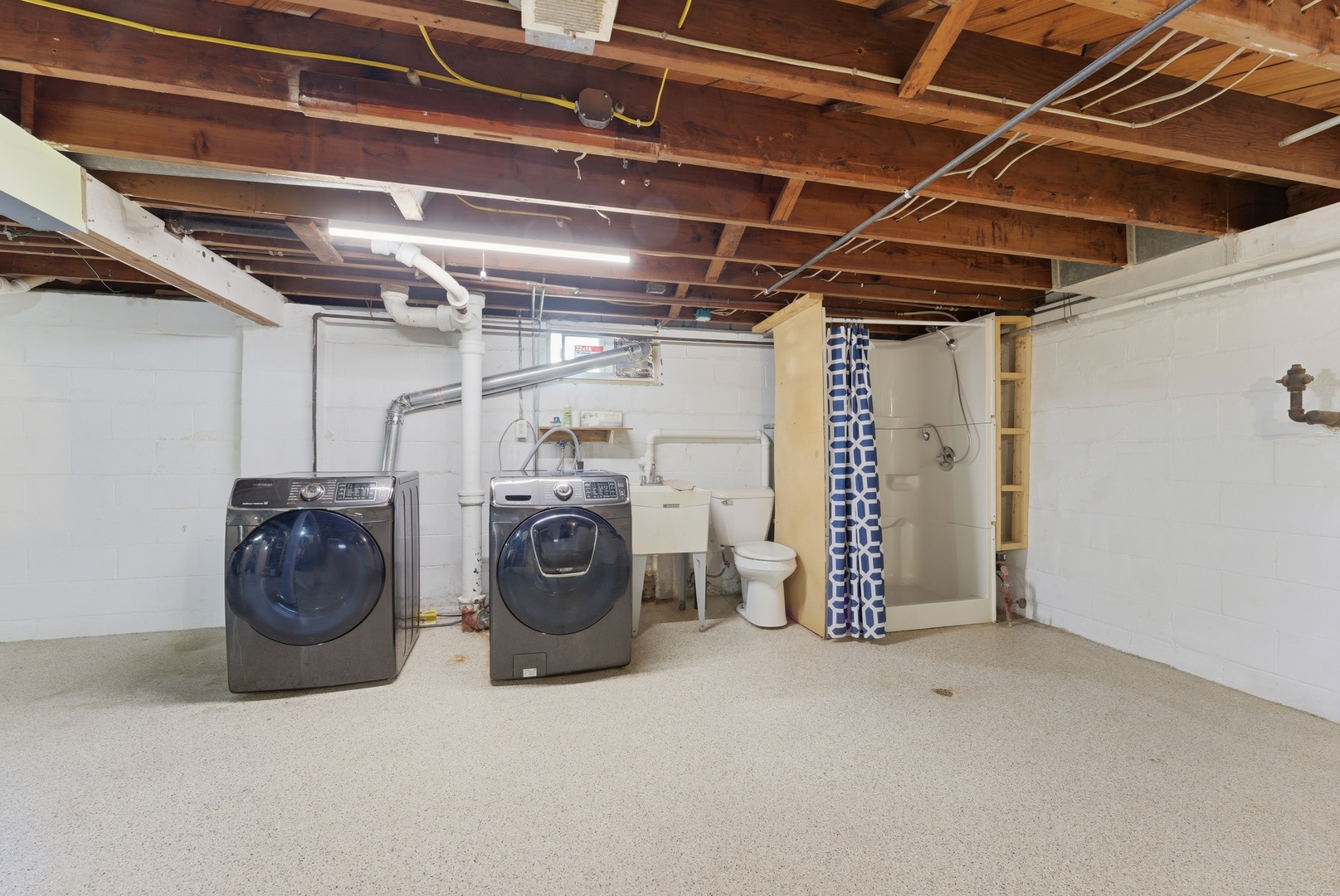 2405 31st Street Moline, IL 61265 - Photo 23 of 24 a view of a storage & utility room with multiple racks