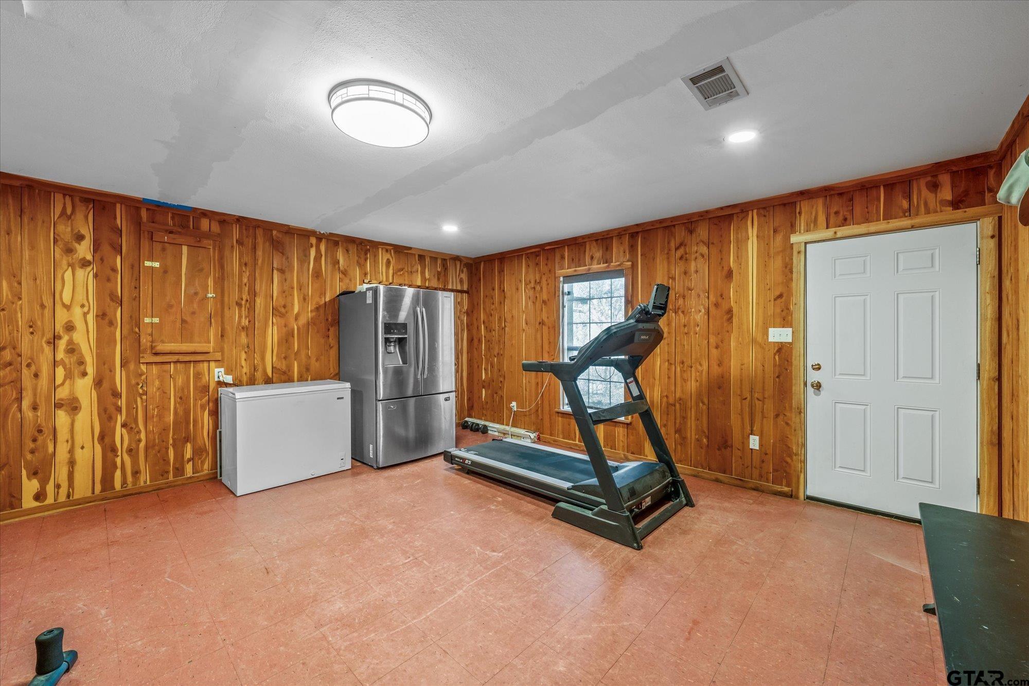 16140 County Road 4009 Mabank, TX 75147 - Photo 23 of 31 a view of a room with gym equipment