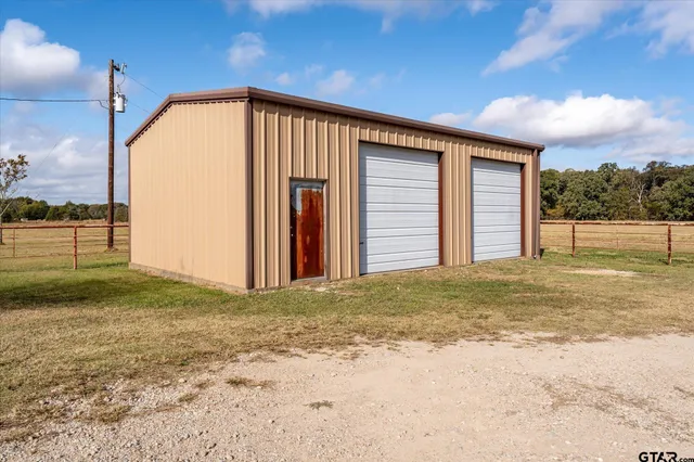 a view of a big room with an entryway