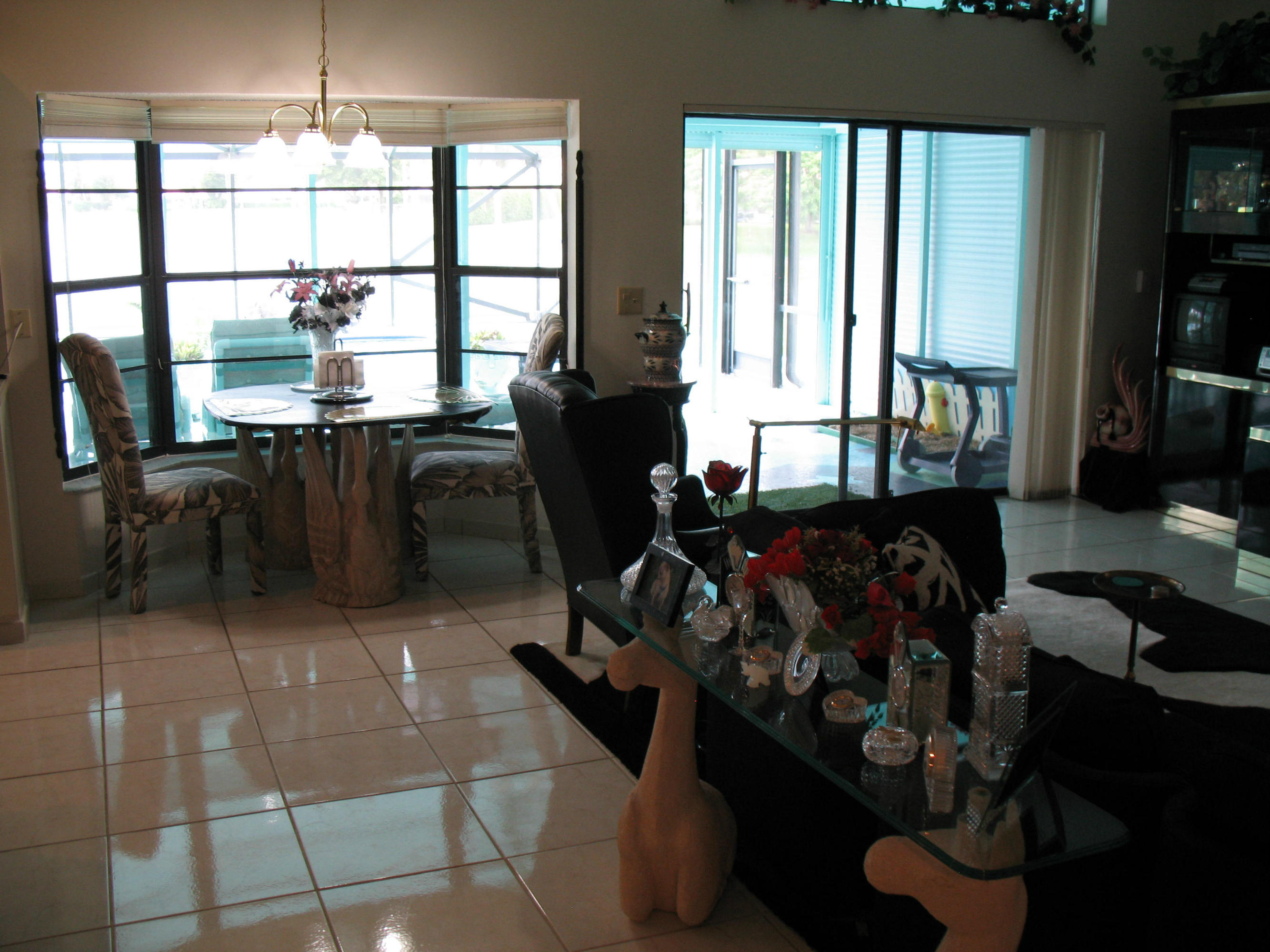 11360 Lake Tree Court Boca Raton, FL 33498 - Photo 12 of 27 Family Room w Sliding Door to Patio