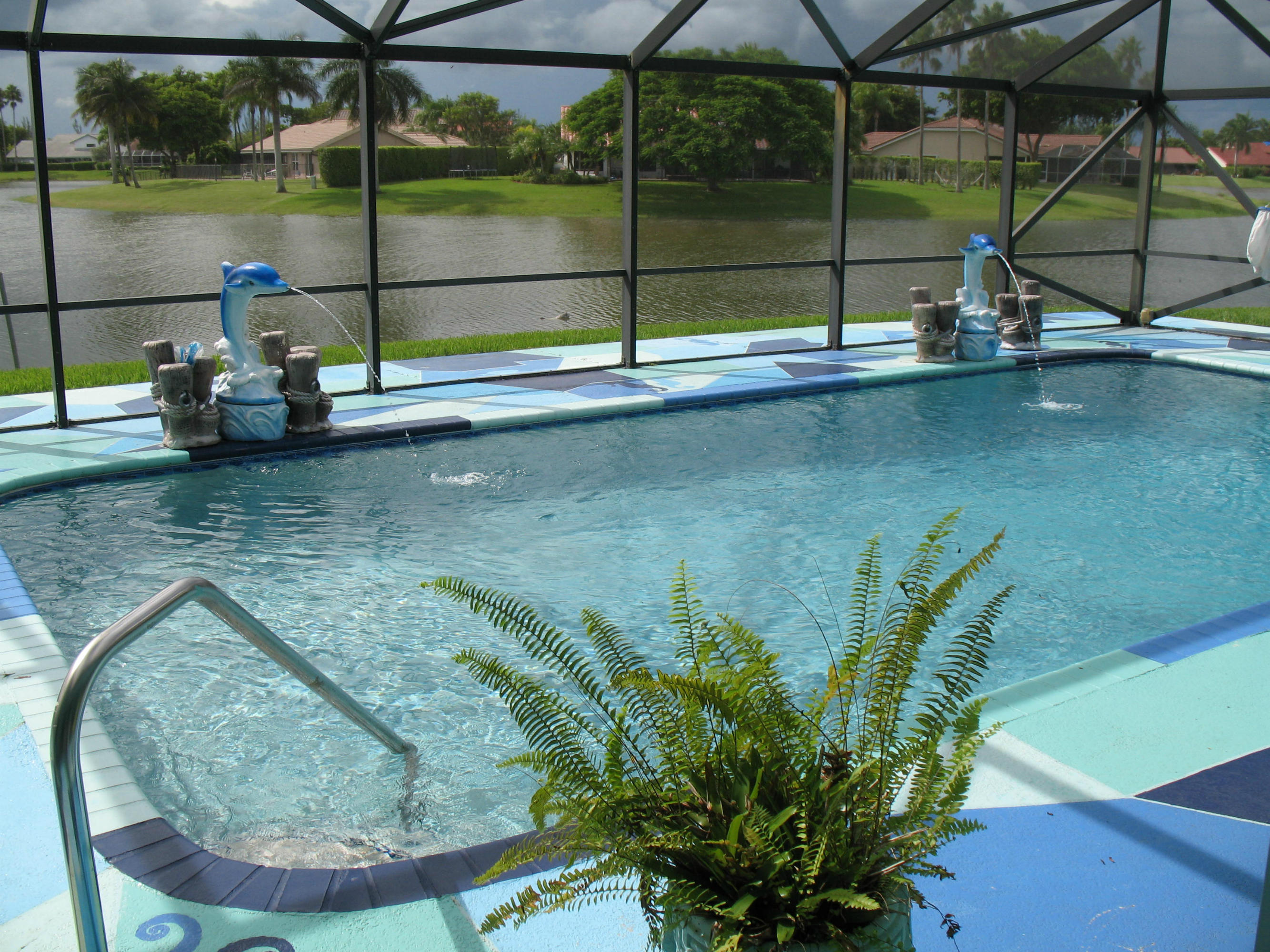 11360 Lake Tree Court Boca Raton, FL 33498 - Photo 3 of 27 Heated Pool w Dolphin Fountains