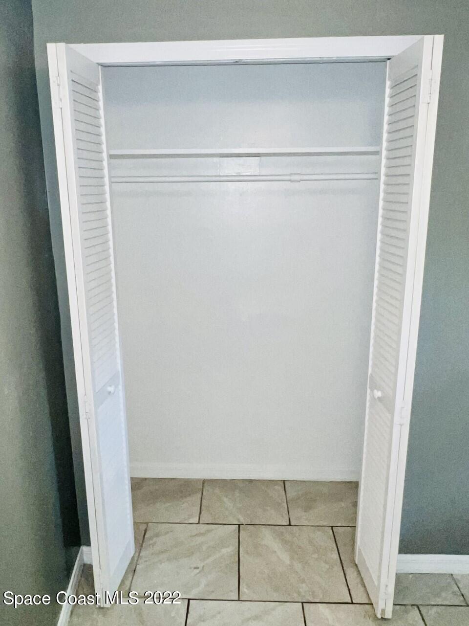 658 Waycross Road Southwest Palm Bay, FL 32908 - Photo 16 of 39 middle room closet 2