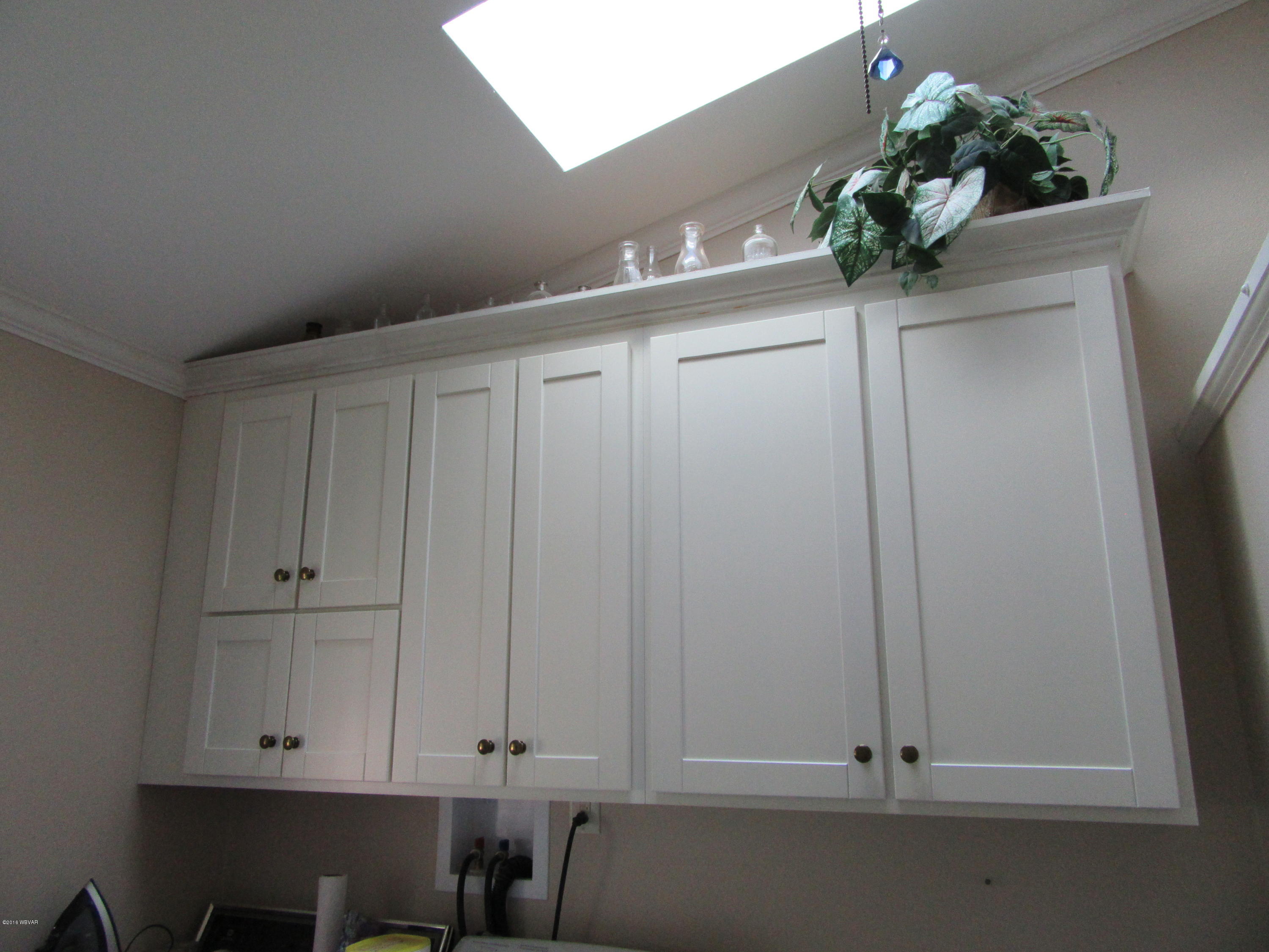 285 Benjamin Road Cogan Station, PA 17728 - Photo 16 of 25 BATH/LAUNDRY CABINETRY