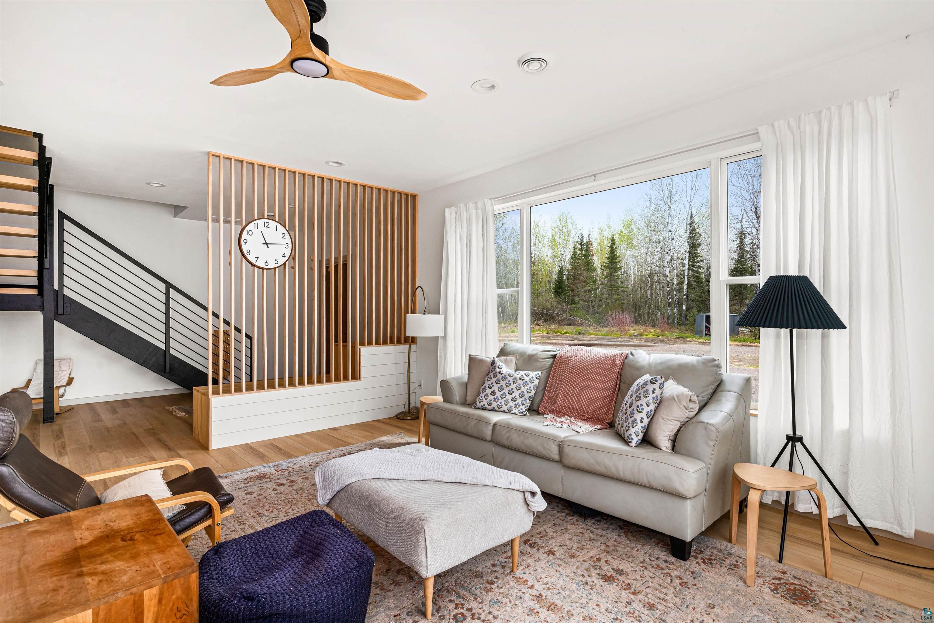 1825 East Shilhon Road Duluth, MN 55804 - Photo 10 of 37 Living room w/large windows with inviting sunshine.