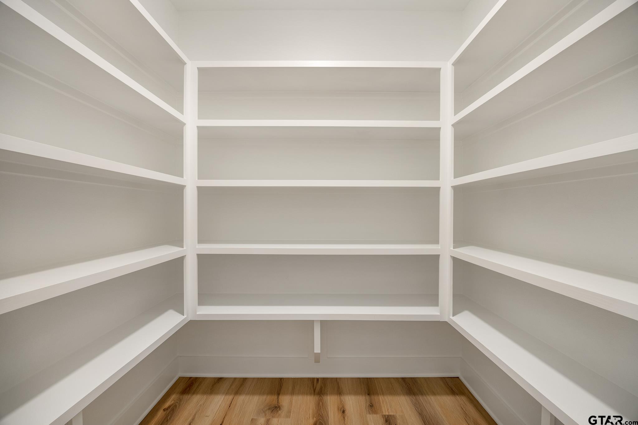 11410 Tucker Circle Flint, TX 75762 - Photo 23 of 43 a walk in closet with empty racks