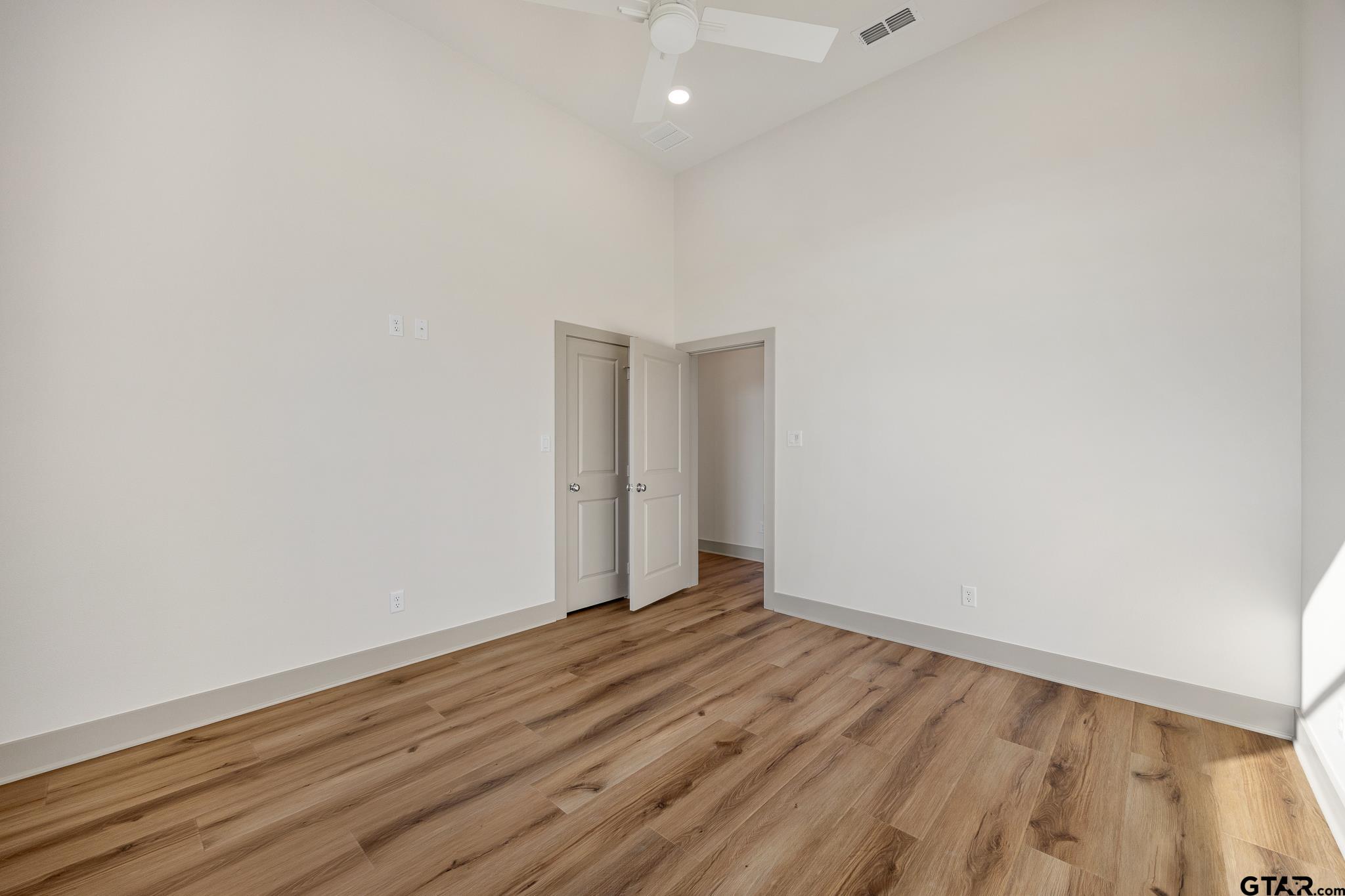 11410 Tucker Circle Flint, TX 75762 - Photo 35 of 43 a view of an empty room with wooden floor
