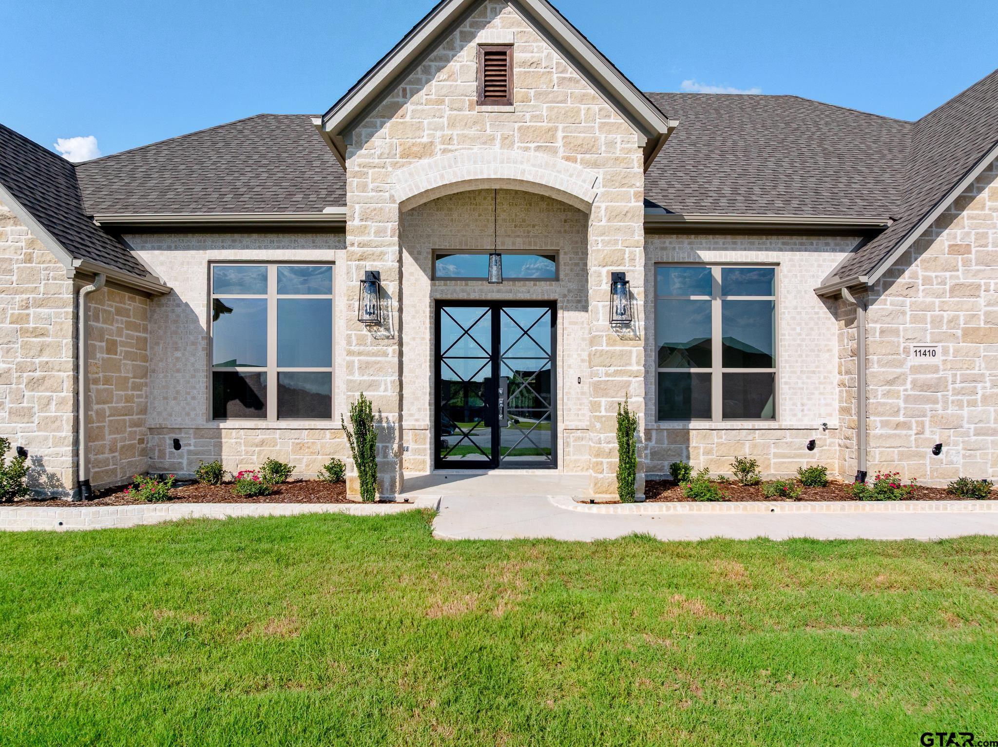 11410 Tucker Circle Flint, TX 75762 - Photo 6 of 43 a front view of a house with a yard