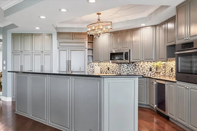 a bathroom with a toilet sink and shower