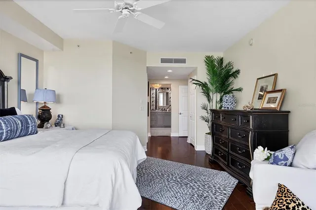 a view of a hallway with a black and white checkered floor
