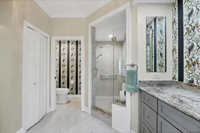 a view of a chairs and table in a backyard