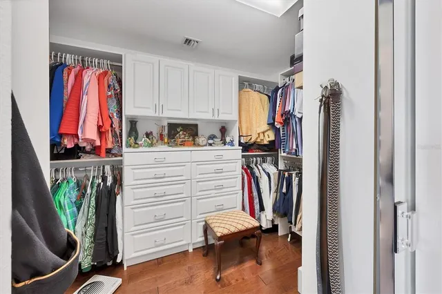 a view of a golf course with a building in the background