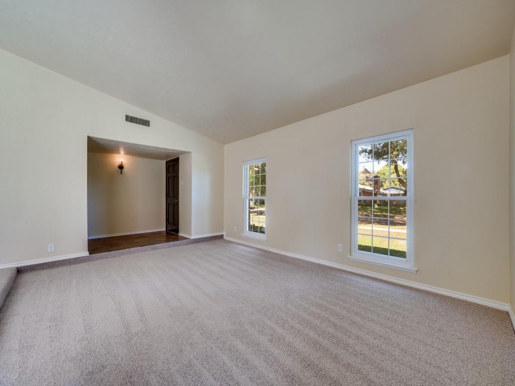 5044 Brandenburg Lane The Colony, TX 75056 - Photo 14 of 33 New installed light colored Carpet in the spacious livingroom.
