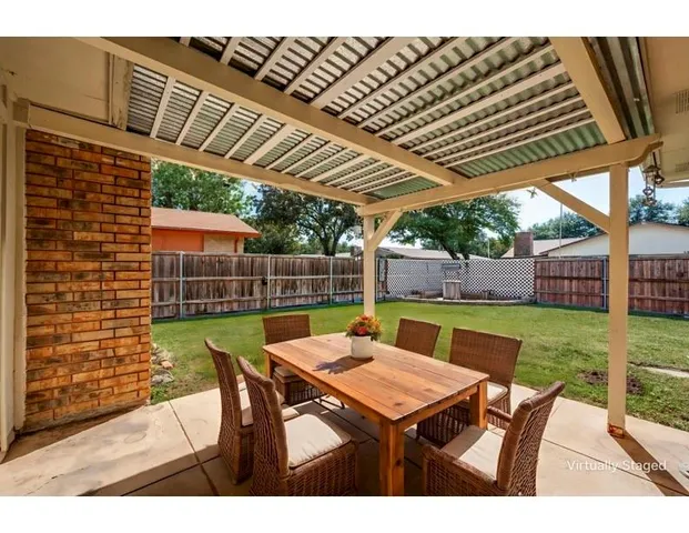 a view of yard with seating space