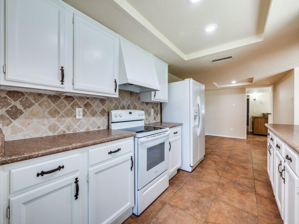 5044 Brandenburg Lane The Colony, TX 75056 - Photo 7 of 33 Kitchen featuring a decorative backsplash, and recessed lighting. There is room for breakfast table at the far end