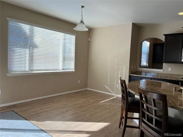 a workspace with furniture and window