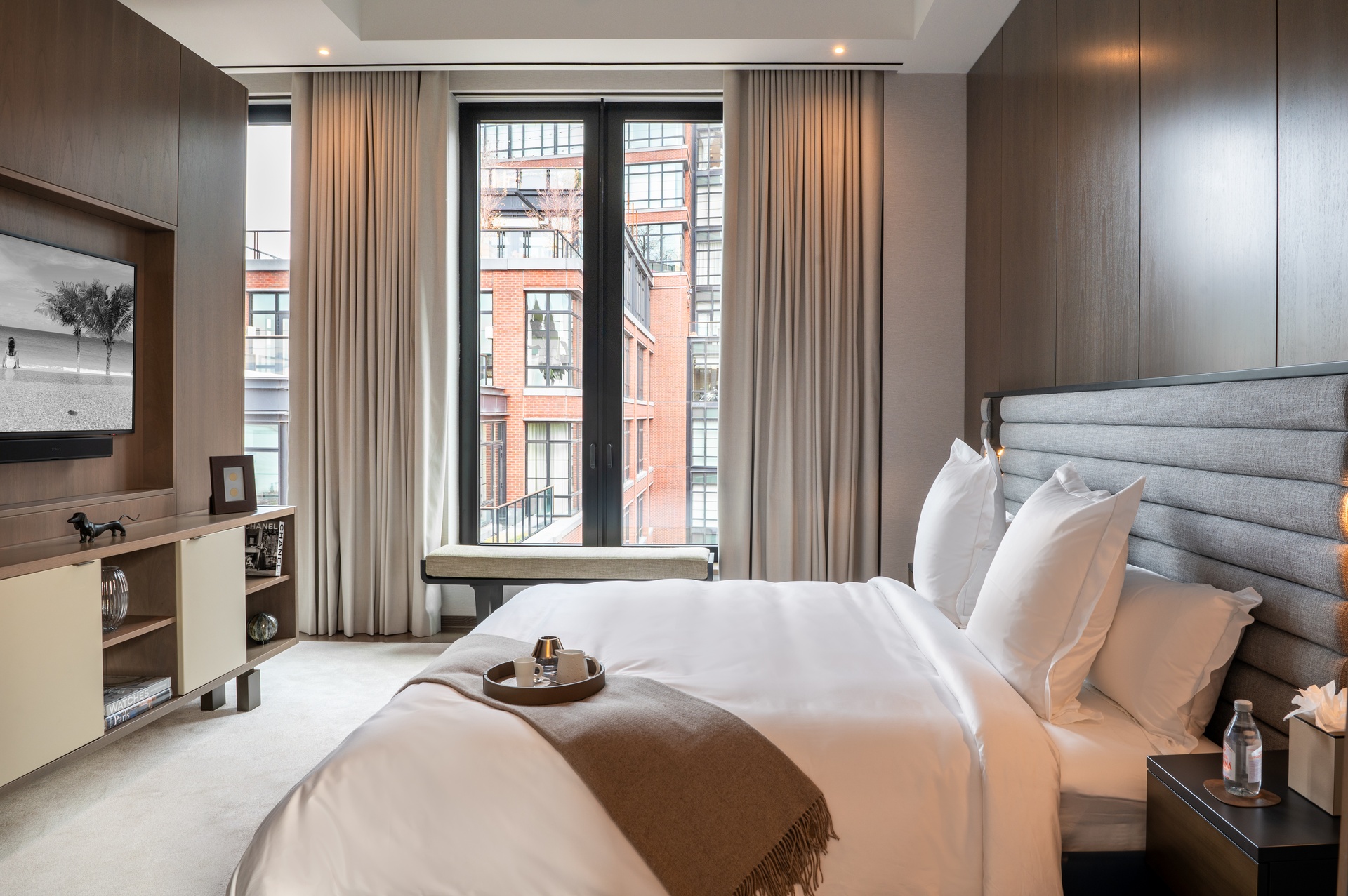 401 West Street, Unit PH Manhattan, NY 10014 - Photo 13 of 23 a bedroom with a bed and a flat tv screen