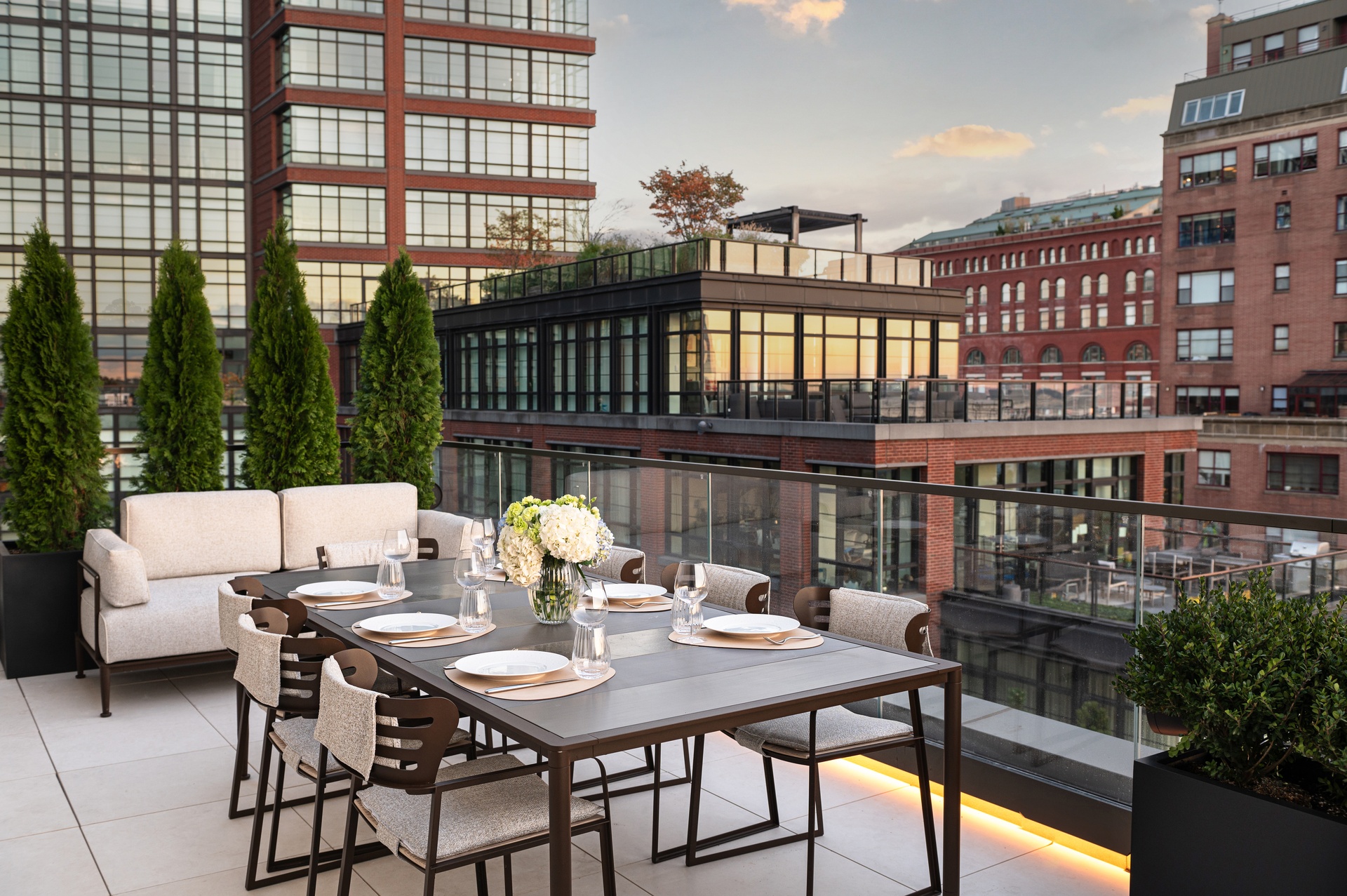 401 West Street, Unit PH Manhattan, NY 10014 - Photo 23 of 23 a balcony with table and chairs