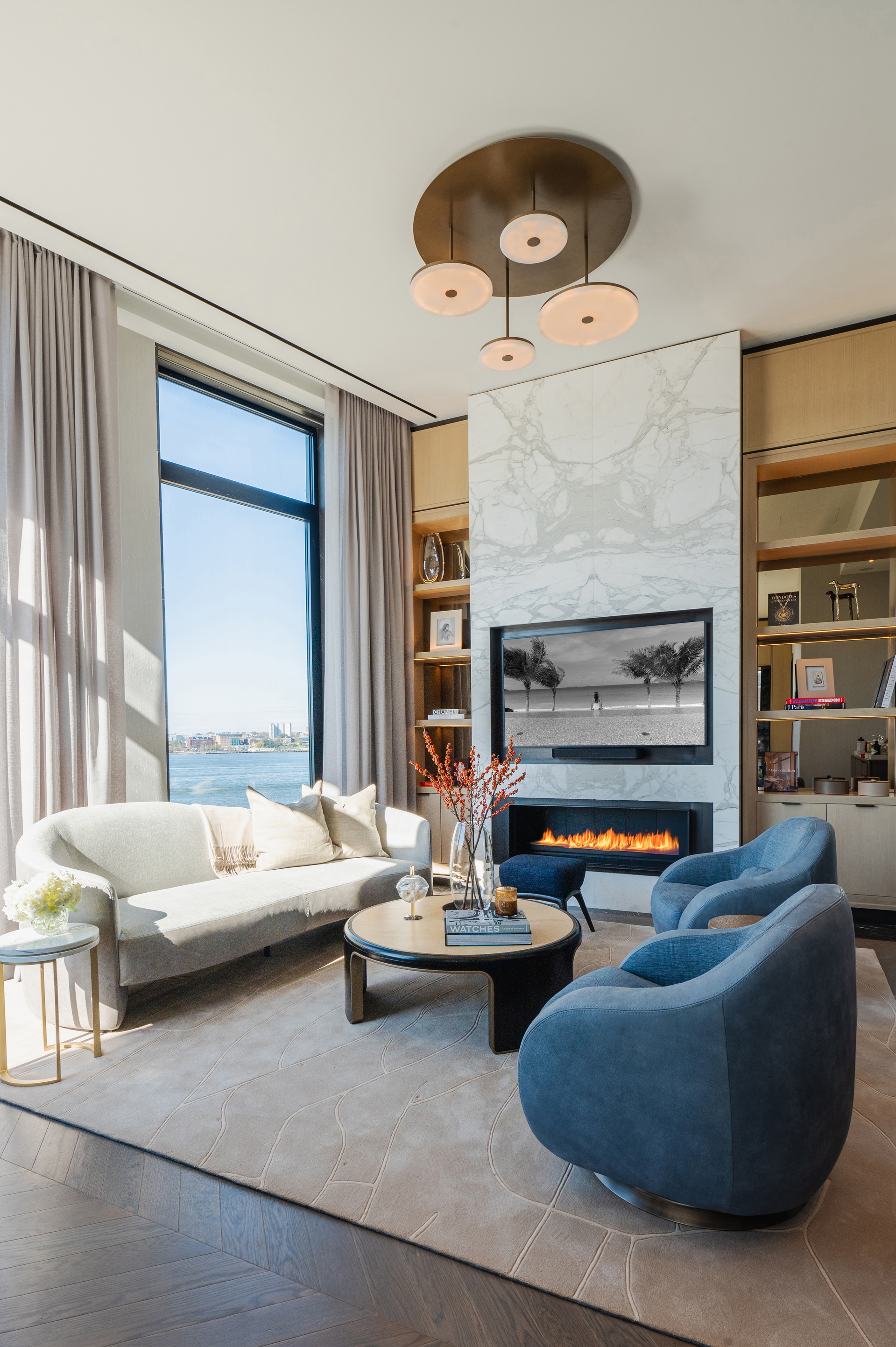 401 West Street, Unit PH Manhattan, NY 10014 - Photo 10 of 23 a living room with furniture and a fireplace