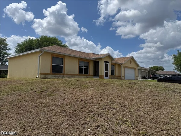 $1,650 | 450 Rathburn Street, Lehigh Acres, FL 33974
