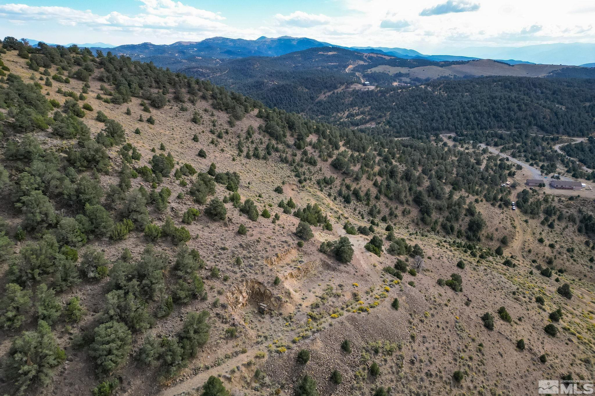 0 Western Skies Drive Reno, NV 89521 - Photo 18 of 20 a view of a dry field with mountains in the background