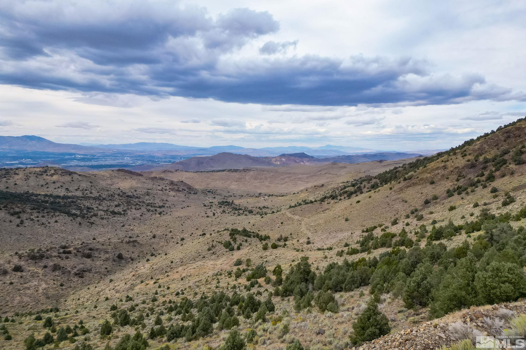 0 Western Skies Drive Reno, NV 89521 - Photo 4 of 20 a view of a dry field with mountains in the background