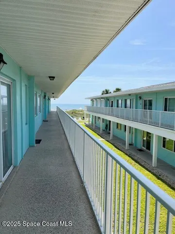 a view of a building from a balcony