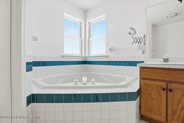 a aerial view of a house with sitting area