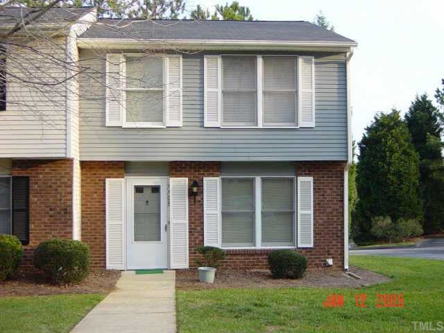 7708 Kingsberry Court Raleigh, NC 27615 - Photo 1 of 1 a front view of a house with garden