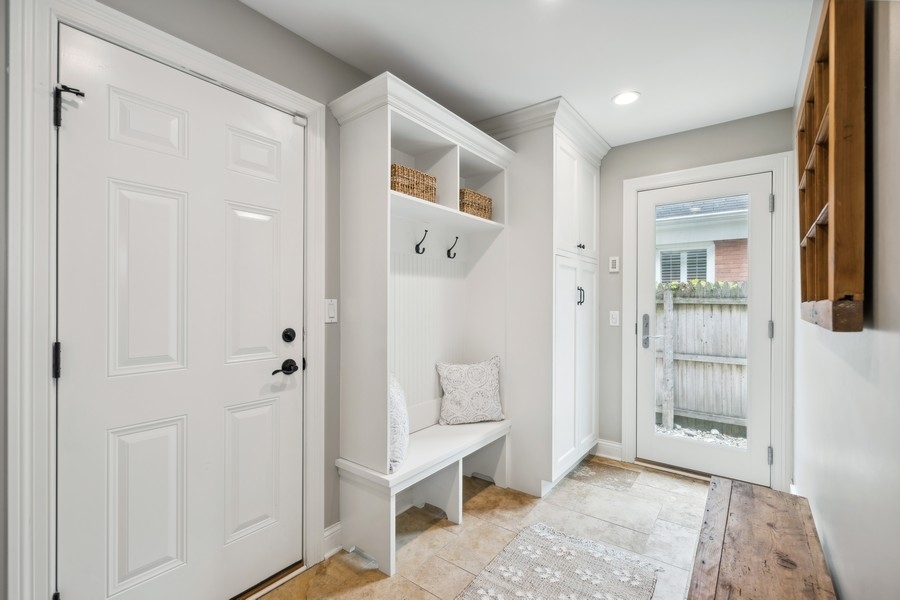 930 Pontiac Road Wilmette, IL 60091 - Photo 16 of 45 a view of a livingroom with wooden floor and a bathroom
