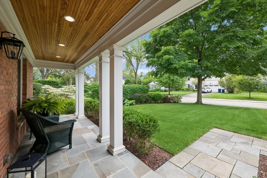 930 Pontiac Road Wilmette, IL 60091 - Photo 2 of 45 a porch with a yard