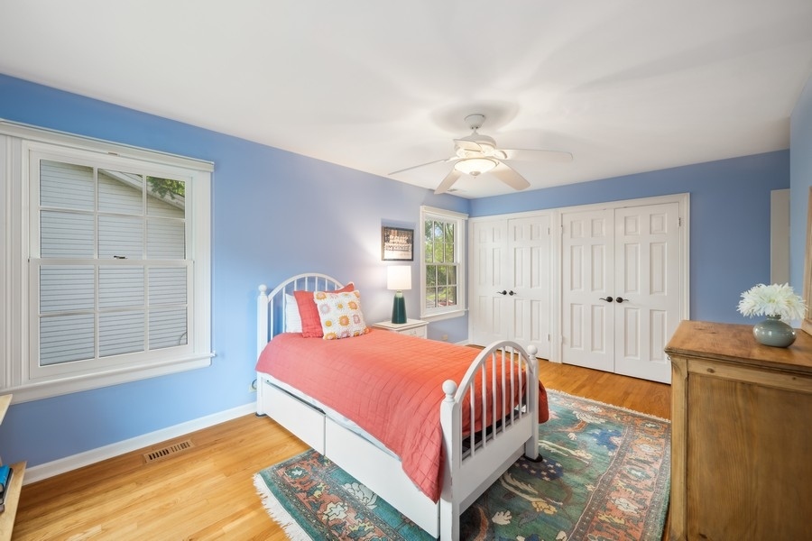 930 Pontiac Road Wilmette, IL 60091 - Photo 26 of 45 a bedroom with a bed and window